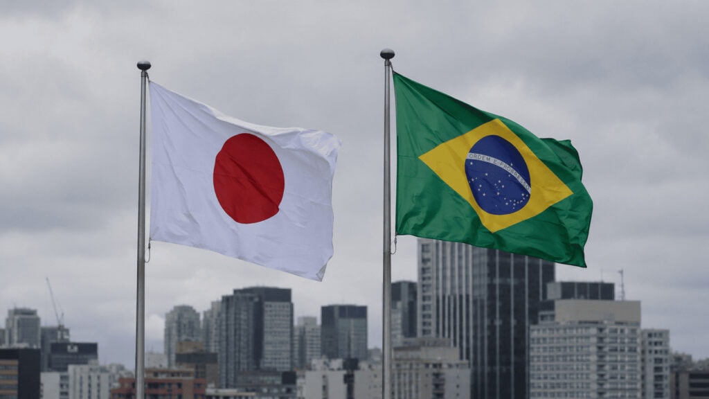 The flags of Japan and Brazil flying side by side